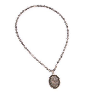 Lot 992 - A VICTORIAN AESTHETIC MOVEMENT SILVER LOCKET ON CHAIN