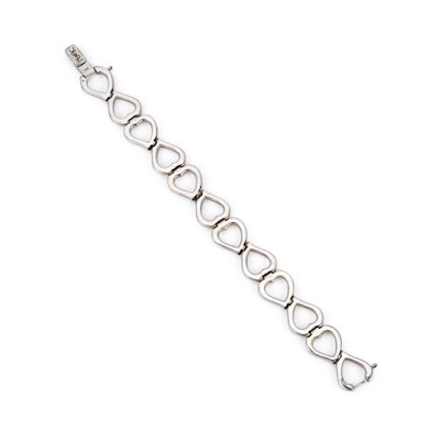 Lot 827 - YVES SAINT LAURENT, A SILVER HEART BRACELET