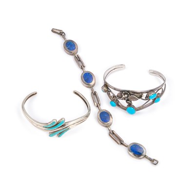 Lot 881 - TWO TURQUOISE TORQUE BANGLES AND A LAPIS LAZULI BRACELET