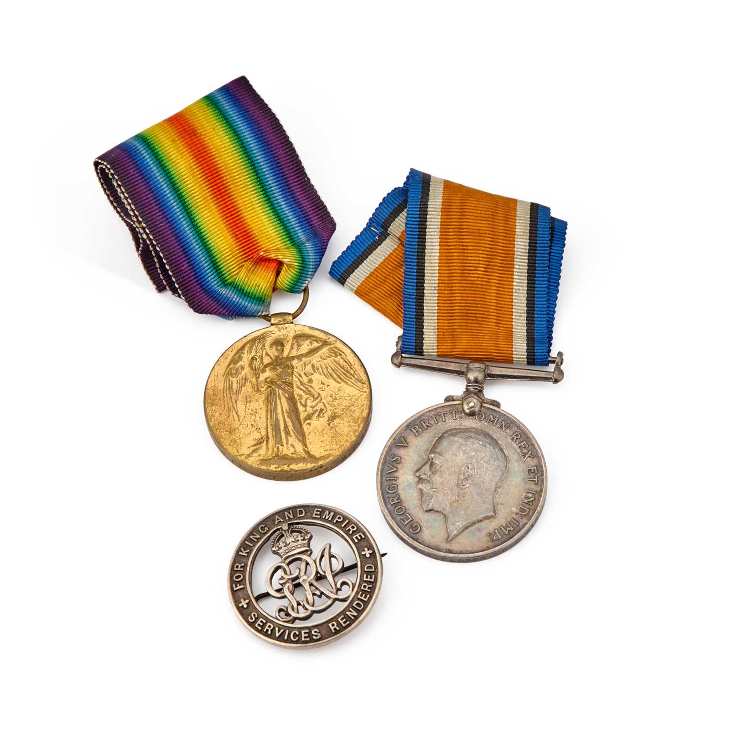 Lot 21 - A FIRST WORLD WAR MEDAL PAIR WITH A SILVER WAR BADGE