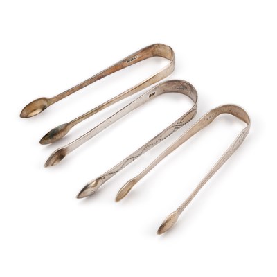 Lot 757 - THREE PAIRS OF GEORGE III AND LATER SILVER SUGAR TONGS