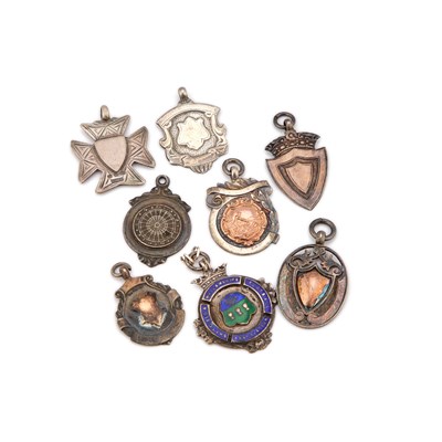 Lot 679 - A GROUP OF EIGHT SILVER FOB MEDALLIONS
