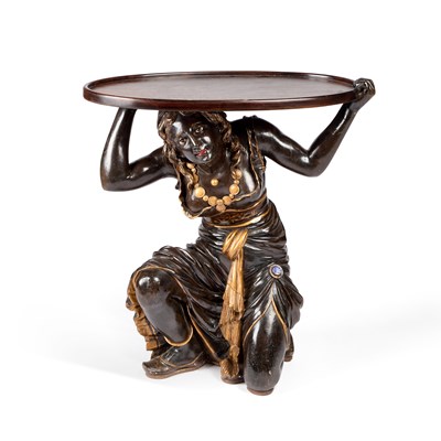 Lot 402 - A PARCEL-GILT CARVED BLACKAMOOR OCCASIONAL TABLE