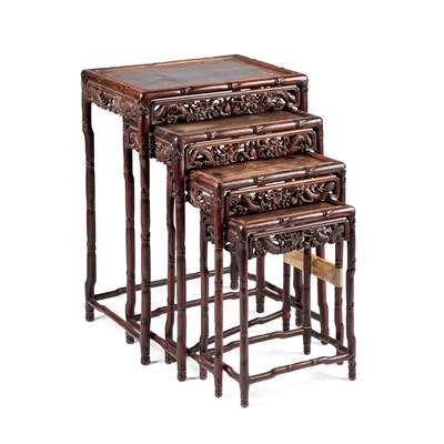Lot 452 - A SET OF FOUR CHINESE HARDWOOD NESTING TABLES