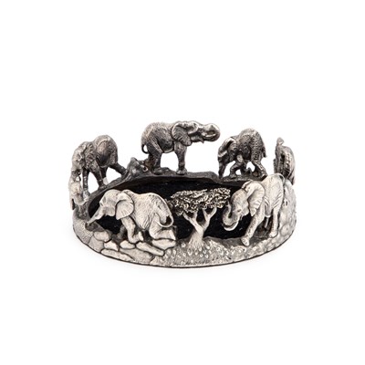 Lot 593 - PATRICK MAVROS: A STERLING SILVER ELEPHANT WINE COASTER