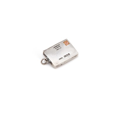 Lot 658 - AN GEORGE V SILVER AND ENAMEL NOVELTY STAMP CASE