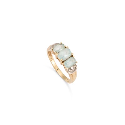 Lot 561 - A 9 CARAT GOLD THREE STONE BLUE TOPAZ RING
