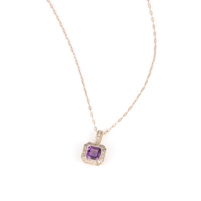 Lot 470 - A 9 CARAT GOLD AMETHYST AND DIAMOND CLUSTER PENDANT ON CHAIN