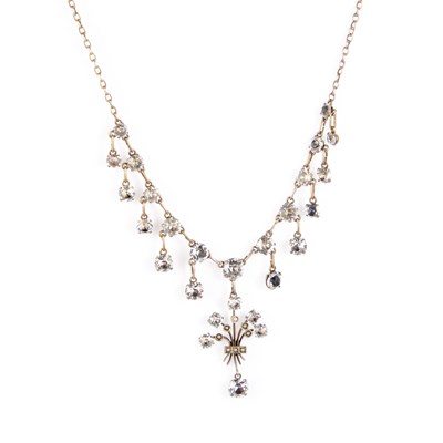 Lot 461 - A WHITE PASTE AND SEED PEARL PENDANT NECKLACE