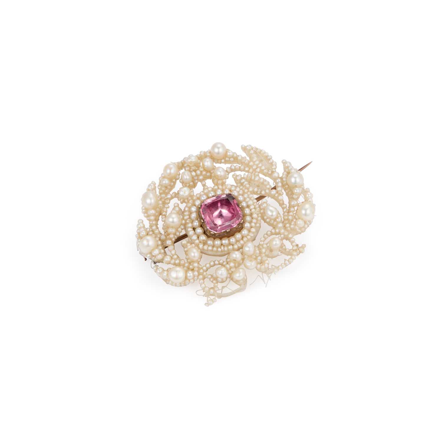 Lot 577 - A GEORGIAN SEED PEARL MOUNTED MOTHER-OF-PEARL AND PINK TOPAZ SENTIMENTAL BROOCH