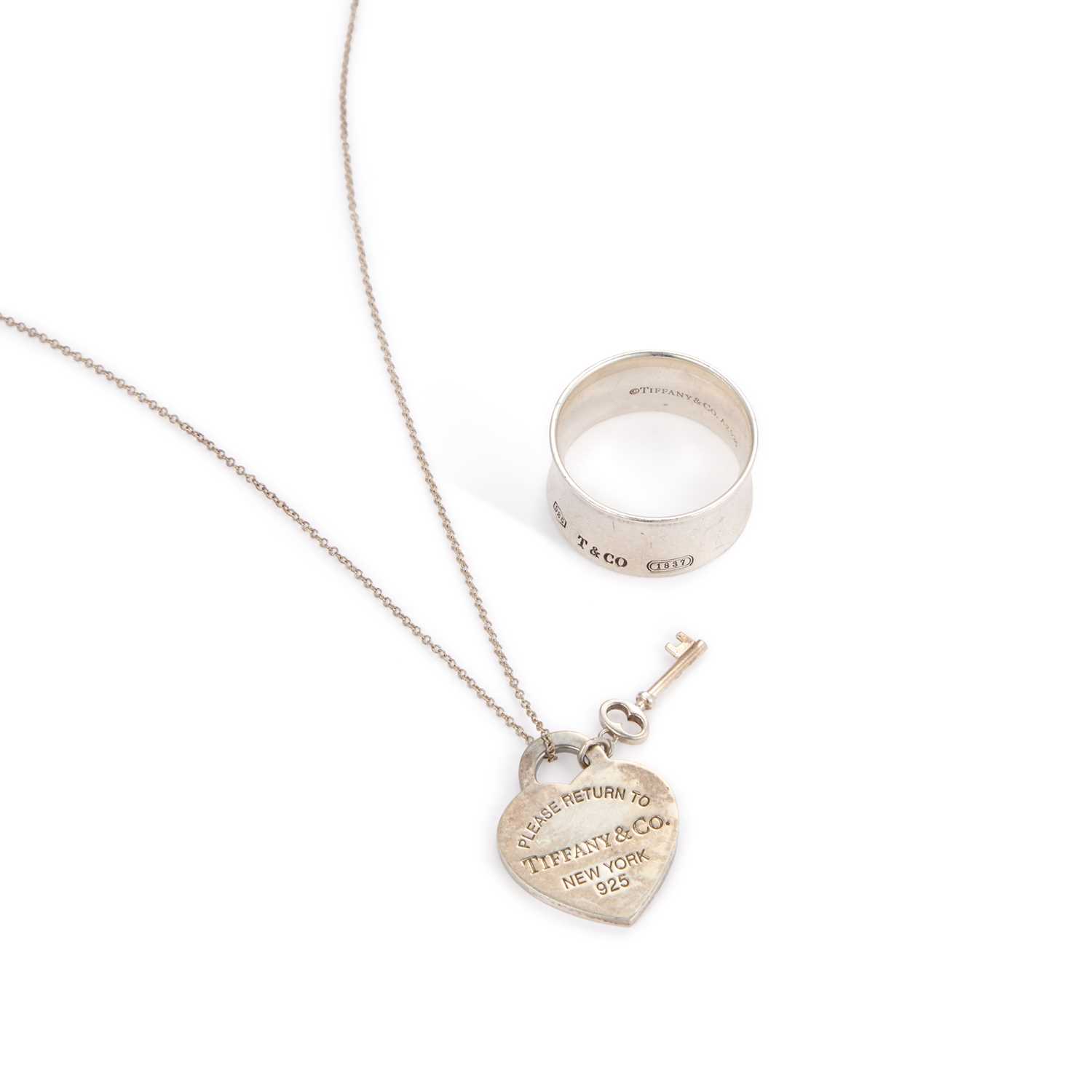 Lot 548 - TIFFANY & CO, A 'RETURN TO TIFFANY' HEART AND KEY PENDANT ON CHAIN AND A 1887 RING