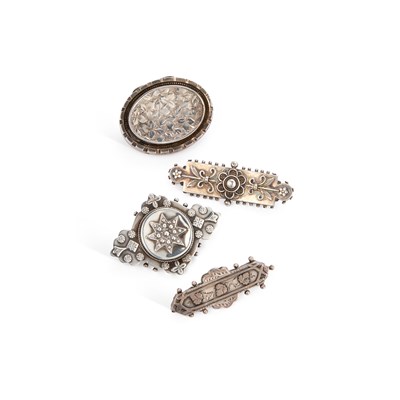 Lot 584 - FOUR VICTORIAN SILVER BROOCHES