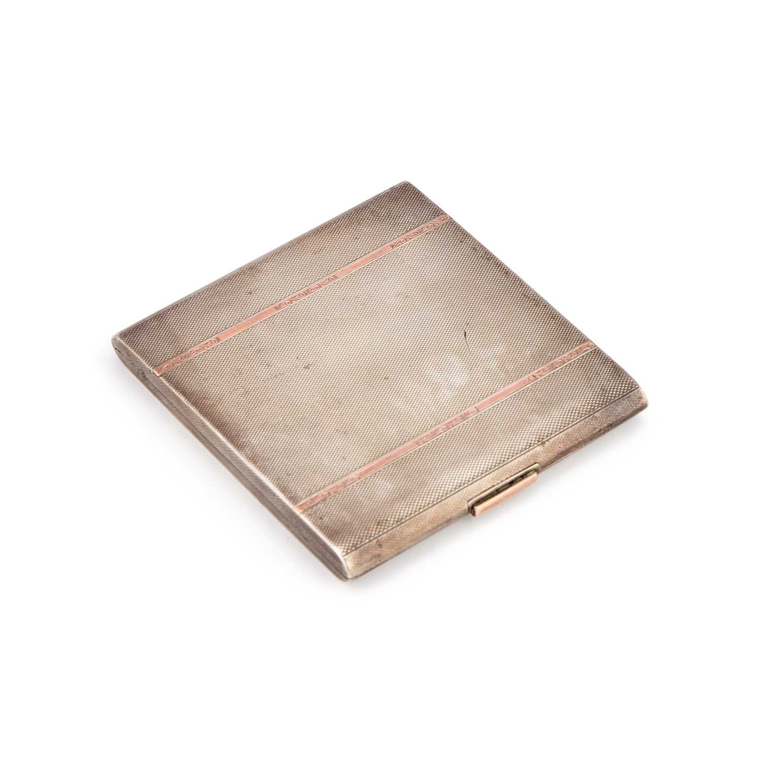 Lot 294 - AN ART DECO ENGINE-TURNED SILVER CIGARETTE CASE