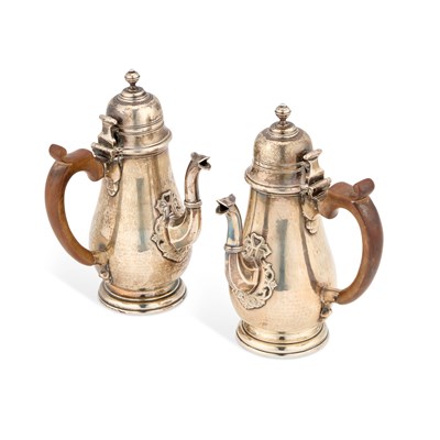 Lot 303 - A PAIR OF GEORGE VI SILVER CHOCOLATE POTS