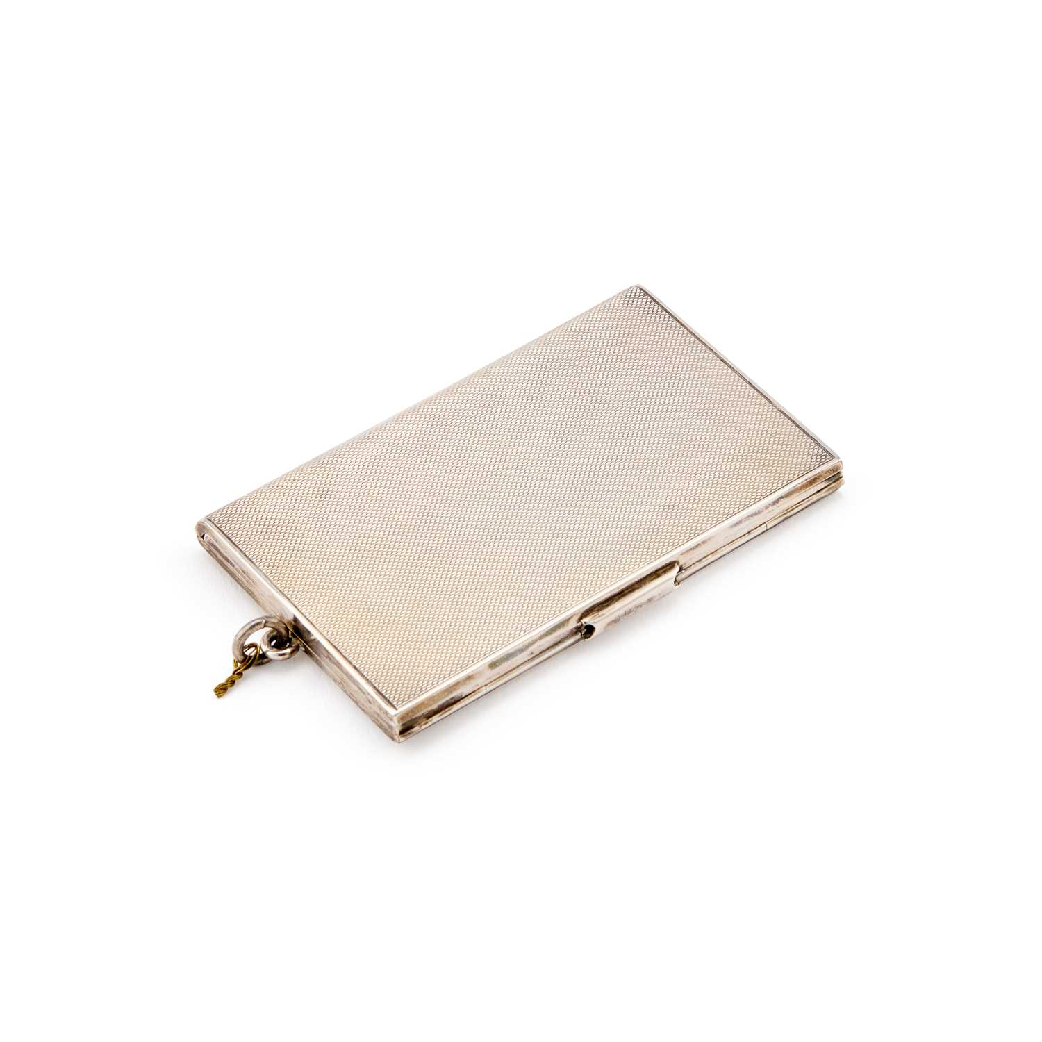 Lot 307 - AN ART DECO ENGINE-TURNED SILVER CARD CASE