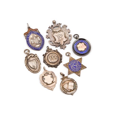Lot 305 - A GROUP OF SEVEN SILVER FOBS/ MEDALLIONS