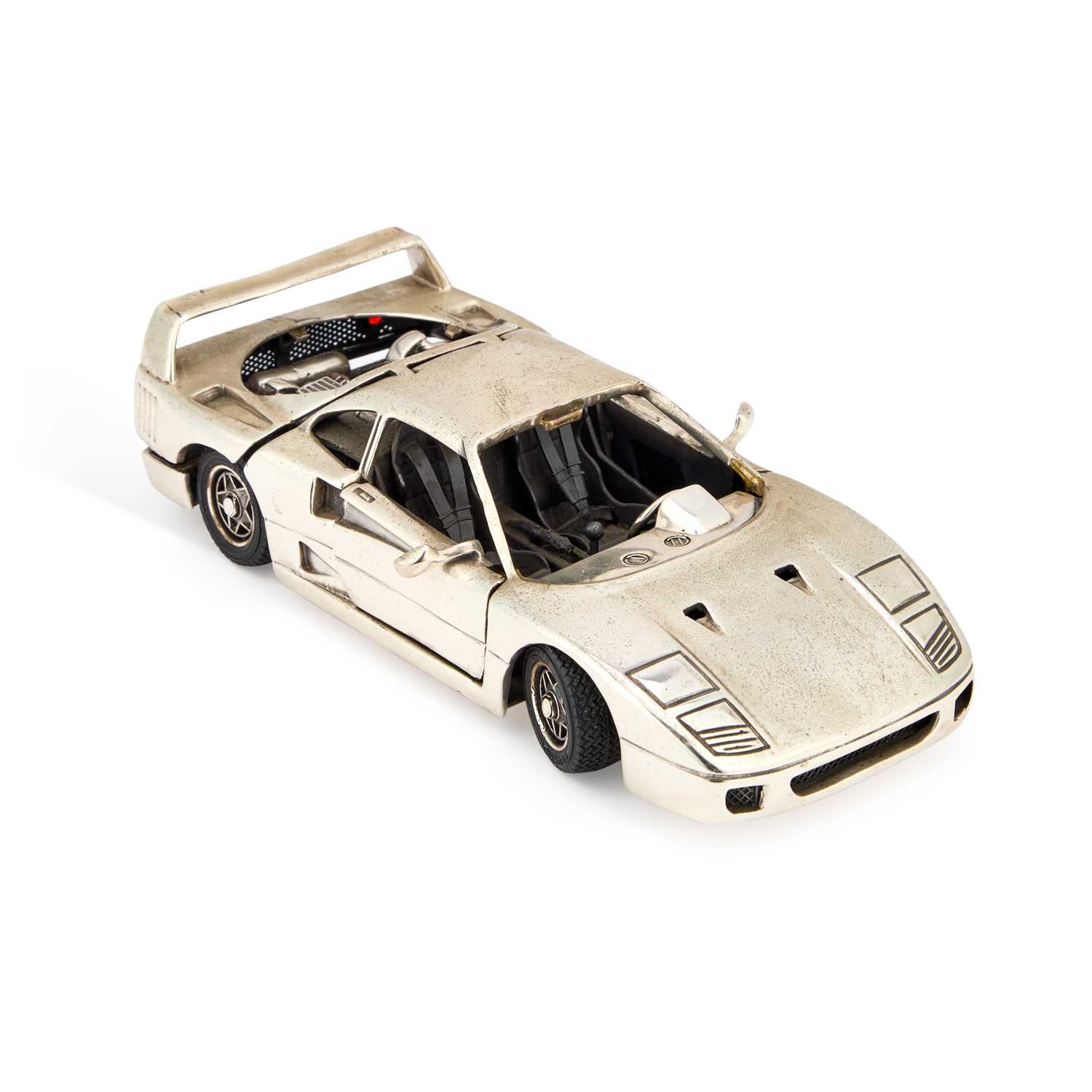 Lot 217 - AN ITALIAN SILVER MODEL OF A FERRARI