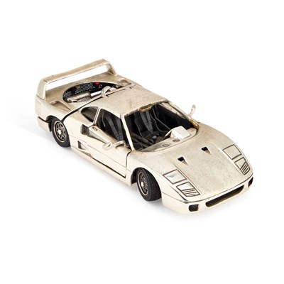 Lot 217 - AN ITALIAN SILVER MODEL OF A FERRARI