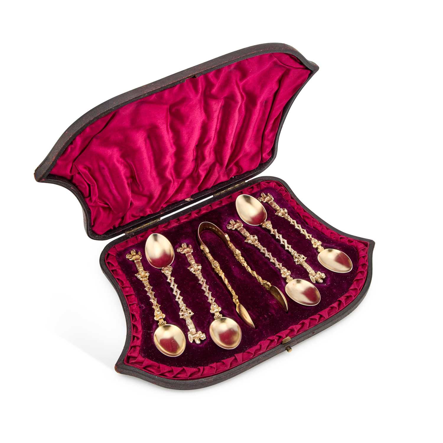 Lot 384 - A SET OF SIX VICTORIAN SILVER-GILT FANCY TEASPOONS AND SUGAR TONGS