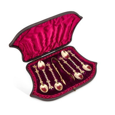 Lot 384 - A SET OF SIX VICTORIAN SILVER-GILT FANCY TEASPOONS AND SUGAR TONGS