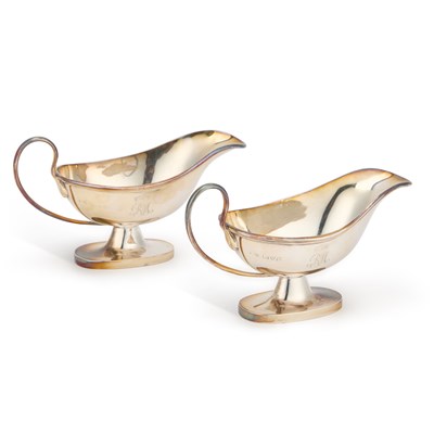 Lot 334 - A PAIR OF GEORGE V SILVER SAUCE BOATS