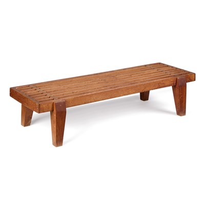 Lot 687 - A COTSWOLD SCHOOL OAK LUGGAGE RACK OR STOOL