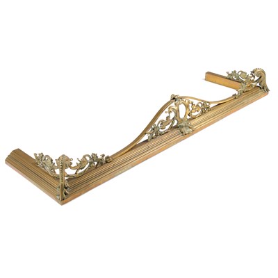 Lot 130 - A LATE VICTORIAN BRASS FENDER