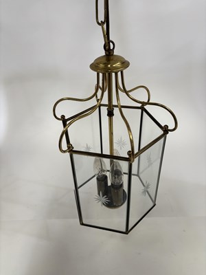 Lot 520 - A BRASS AND ETCHED GLASS HANGING LANTERN