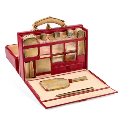 Lot 322 - AN ART DECO SILVER-GILT MOUNTED TRAVELLING VANITY SET