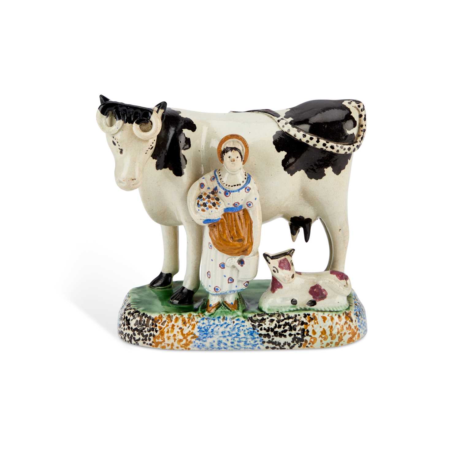Lot 42 - A YORKSHIRE PRATT WARE COW GROUP