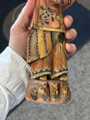 Lot 67 - A PAIR OF CHINESE POLYCHROME-DECORATED TERRACOTTA FIGURES