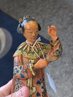 Lot 67 - A PAIR OF CHINESE POLYCHROME-DECORATED TERRACOTTA FIGURES