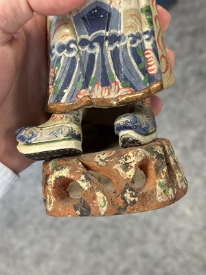 Lot 67 - A PAIR OF CHINESE POLYCHROME-DECORATED TERRACOTTA FIGURES