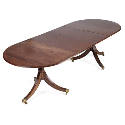 Lot 690 - A REGENCY STYLE MAHOGANY TWIN-PEDESTAL DINING TABLE