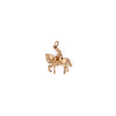Lot 543 - A 9 CARAT GOLD LADY GODIVA CHARM PENDANT
