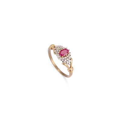 Lot 456 - A 9 CARAT GOLD RUBY AND DIAMOND CLUSTER RING
