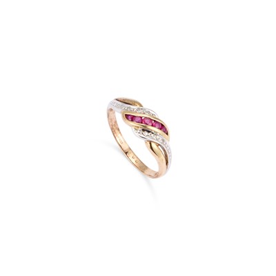 Lot 438 - A 9 CARAT GOLD RUBY AND DIAMOND BAND RING