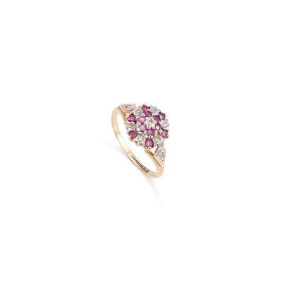 Lot 421 - A 9 CARAT GOLD RUBY AND DIAMOND CLUSTER RING