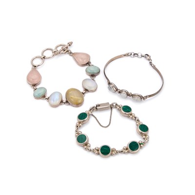 Lot 405 - THREE GEMSTONE BRACELETS