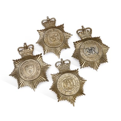 Lot 15 - FOUR ELIZABETH II POLICE HELMET PLATES