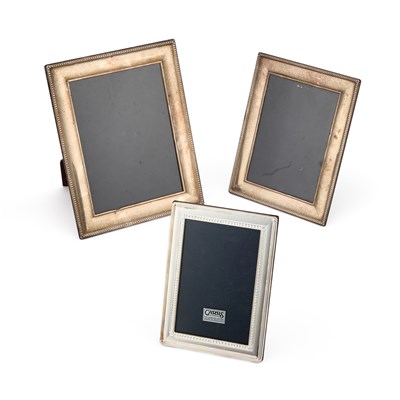 Lot 312 - THREE MODERN SILVER-MOUNTED PHOTOGRAPH FRAMES