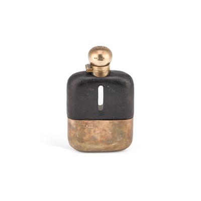 Lot 320 - A GEORGE V SILVER-MOUNTED HIP FLASK