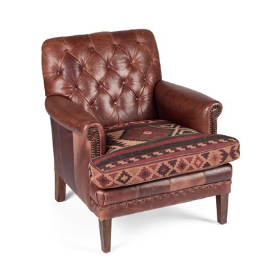 Lot 688 - A BROWN LEATHER BUTTONED BACK ARMCHAIR