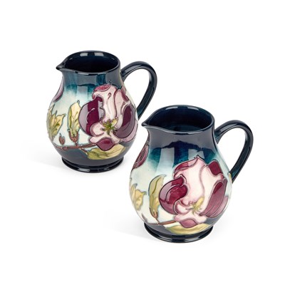 Lot 106 - A PAIR OF MOORCROFT POTTERY JUGS