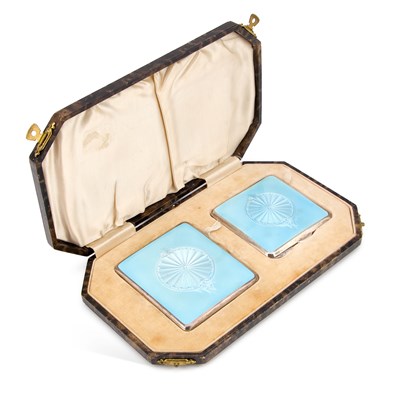 Lot 333 - A GEORGE VI SILVER AND ENAMEL COMPACT AND CIGARETTE CASE