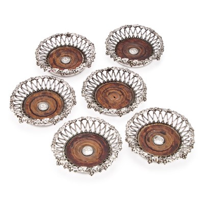 Lot 163 - A GOOD SET OF SIX 19TH CENTURY SILVER-PLATED COASTERS