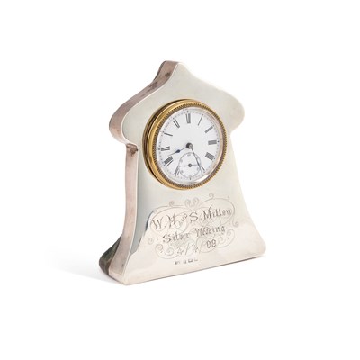 Lot 269 - AN EDWARDIAN SILVER-MOUNTED CLOCK