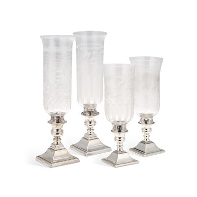 Lot 522 - A GROUP OF FOUR SILVER-PLATED HURRICANE LAMPS