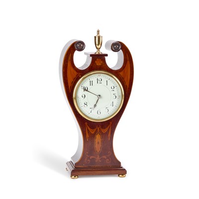 Lot 672 - AN EDWARDIAN INLAID MAHOGANY MANTEL CLOCK