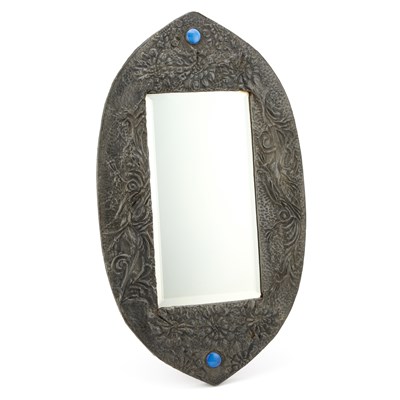 Lot 721 - AN EARLY 20TH CENTURY PEWTER-MOUNTED WALL MIRROR